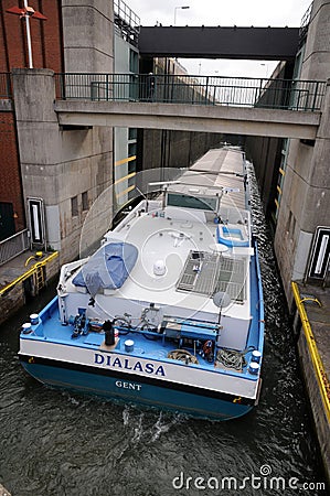 Cargo ship in river lock Editorial Stock Photo