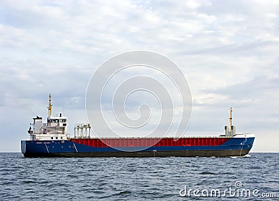 Cargo ship at sea Stock Photo