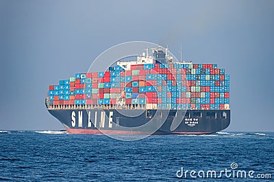 Cargo ship at sea Editorial Stock Photo