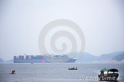 Cargo Ship in sea sailing go to ocean at Repulse Bay in Hong Kong Editorial Stock Photo