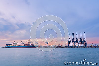 Cargo ship in Trade Port , Container loading Shipping by crane Stock Photo