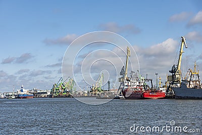 Cargo ships and cranes Klaipeda Editorial Stock Photo