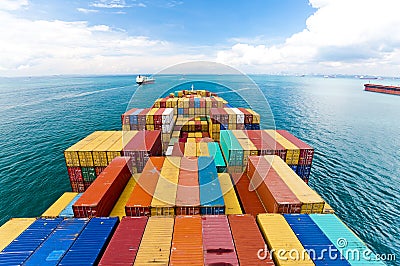 Cargo ships entering one of the busiest ports in the world, Singapore. Stock Photo
