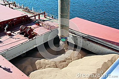 Cargo terminal for loading bulk cargoes woodpellets and containers by coastal cranes. Port Prince Ruppert BC, Canada. Stock Photo