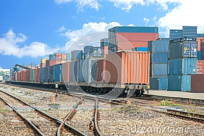 Cargo train platform with freight train container at depot Stock Photo