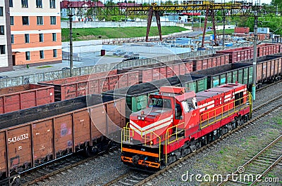 Cargo train in sorting freight railway station, rail freight transport Editorial Stock Photo