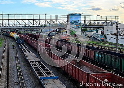 Cargo train in sorting freight railway station, rail freight transport Editorial Stock Photo