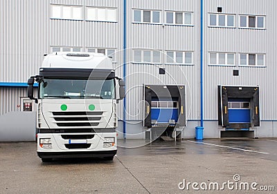 Cargo Transportation - Truck in the warehouse Stock Photo