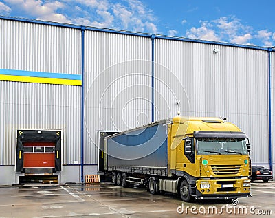 Cargo truck at warehouse building Editorial Stock Photo