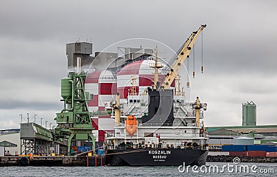 Cargo vessel in port Editorial Stock Photo