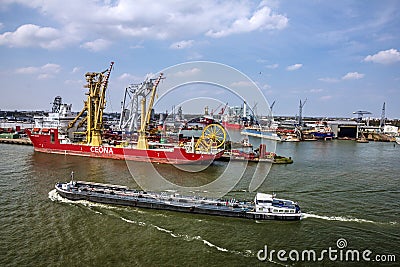 Cargo vessel in sea port Rotterdam, Netherlands. Editorial Stock Photo