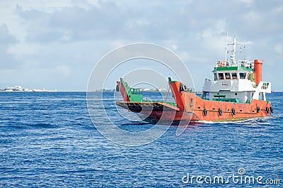 The cargoship in the Indian Ocean Maldives Stock Photo