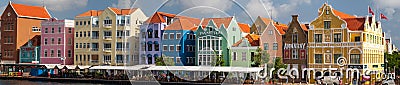 Pastel painted buildings on Handelskade, Town Quay, Willemstad, Curaçao Editorial Stock Photo