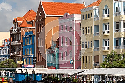 Pastel painted buildings on Handelskade, Town Quay, Willemstad, Curaçao Editorial Stock Photo