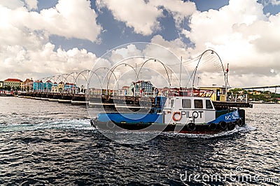 Queen Emma Bridge opened to allow the Pilot boat passage Editorial Stock Photo