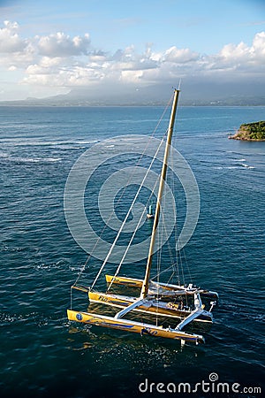 Flo – Florence Arthaud’s iconic 60ft trimaran leaving Guadeloupe Editorial Stock Photo