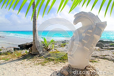 Caribbean Tulum Mexico beach mayan face statue Stock Photo