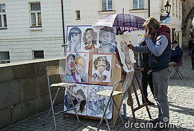 Caricature painter in Prague Editorial Stock Photo