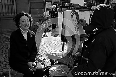 Caricaturist performing on street Editorial Stock Photo