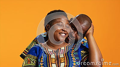 Caring husband hugging his wife in front of camer Stock Photo