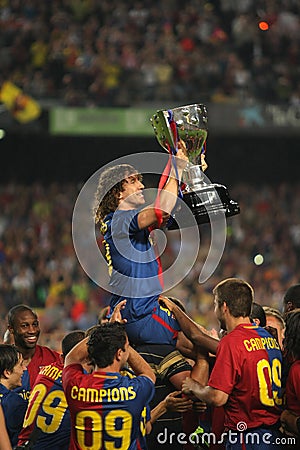 Carles Puyol holds up La Liga Trophy Editorial Stock Photo