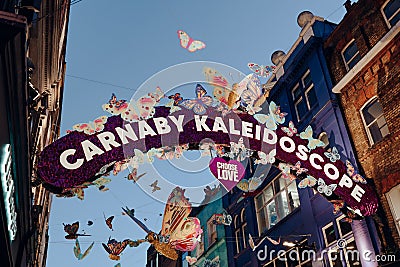 Carnaby Kaleidoscope Christmas arch at the entrance of Carnaby Street, London, UK Editorial Stock Photo