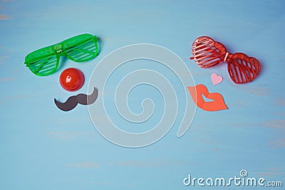 Carnival background with male and female funny party glasses. Stock Photo