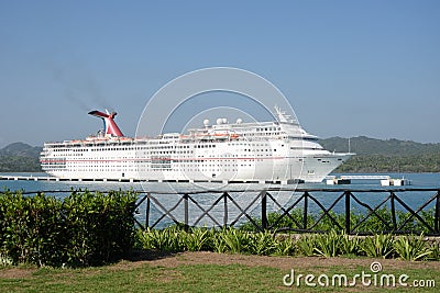 Carnival ecstasy Cruise Ship in port with land in foreground Editorial Stock Photo