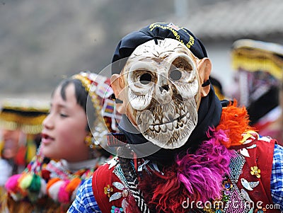 festival of the Virgen del Carmen in the town of Paucartambo celebrating singing, dancing with masks with grotesque Editorial Stock Photo