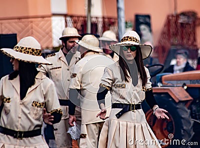 2020 carnival in Italy, parade of allegorical floats in the Venetian municipality of ScorzÄ—. masked women dancing. Editorial Stock Photo