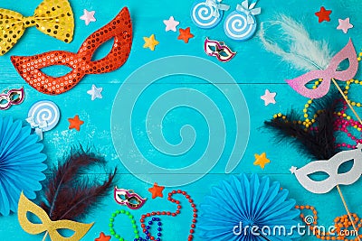 Carnival or mardi gras background with carnival masks, beards and photo booth props Stock Photo