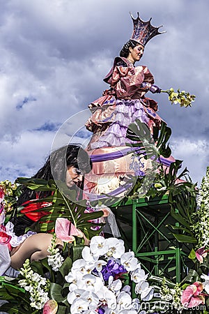 Carnival of Nice, Flowers` battle. This is the main winter event of the Riviera. Flag bearers Editorial Stock Photo