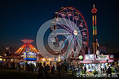 Carnival rides at night Editorial Stock Photo