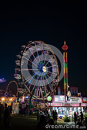 Carnival rides at night Editorial Stock Photo