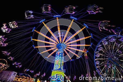 Carnival rides at night Editorial Stock Photo