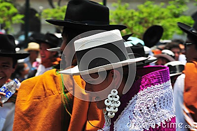 Carnival of Tacna Peru, tradition of Andean migration -couples dancing with multicolored clothes Editorial Stock Photo