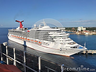 Carnival cruise ships docked in Cozumel, Mexico - 11/27/17 - The Carnival Triumph docked in Cozumel, Mexico Editorial Stock Photo