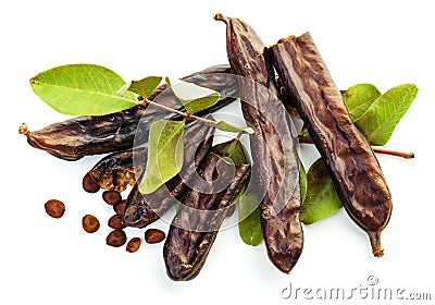 Carob beans. Healthy organic sweet carob pods Stock Photo