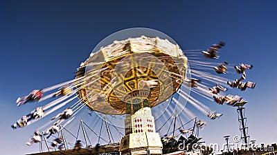 Carousel spinning people enjoyable time Easter Show Stock Photo