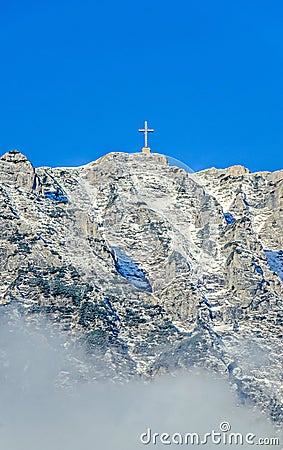 Carpathian mountains, Bucegi with Cross in top of Caraiman Peak Stock Photo