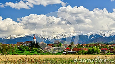 Transylvania village in Romania, in the spring with mountains in the background Stock Photo