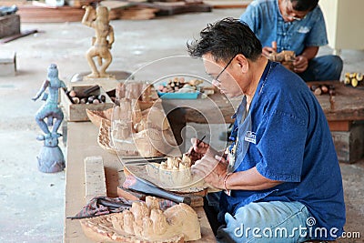 A carpenter in Ancient Siam in Bangkok. Editorial Stock Photo