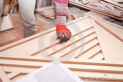 Woodworker makes plywood product Stock Photo