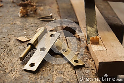 Carpenter with a hinge Stock Photo