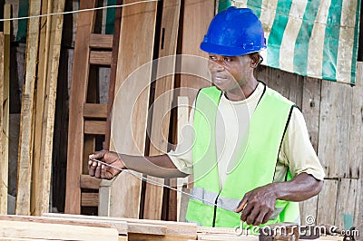 Carpenter and his tools. Stock Photo