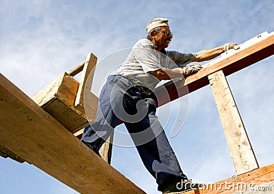 Carpenter measuring the woods Stock Photo