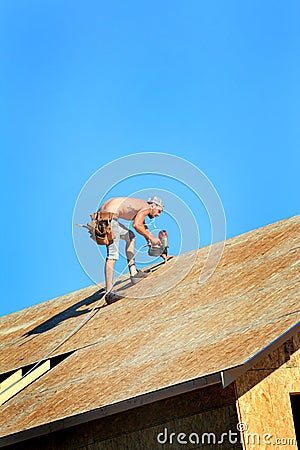 Carpenter with Nail Gun Stock Photo