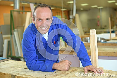 Carpenter posing in workshop Stock Photo