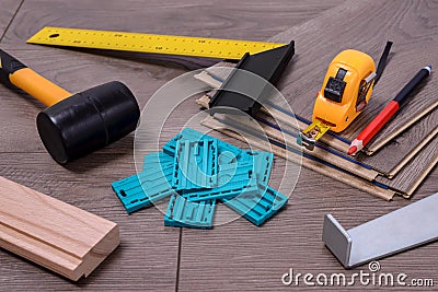 Carpenter tools on laminated flooring Stock Photo