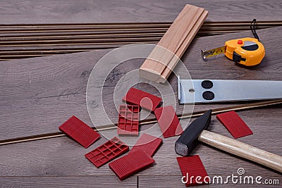 Carpenter tools on laminated flooring Stock Photo